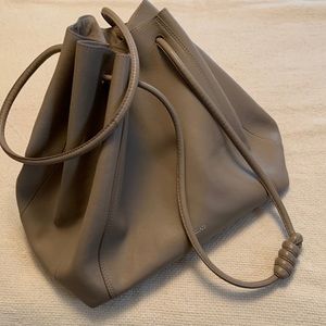 Aritzia Auxiliary Taupe Leather Bucket Bag